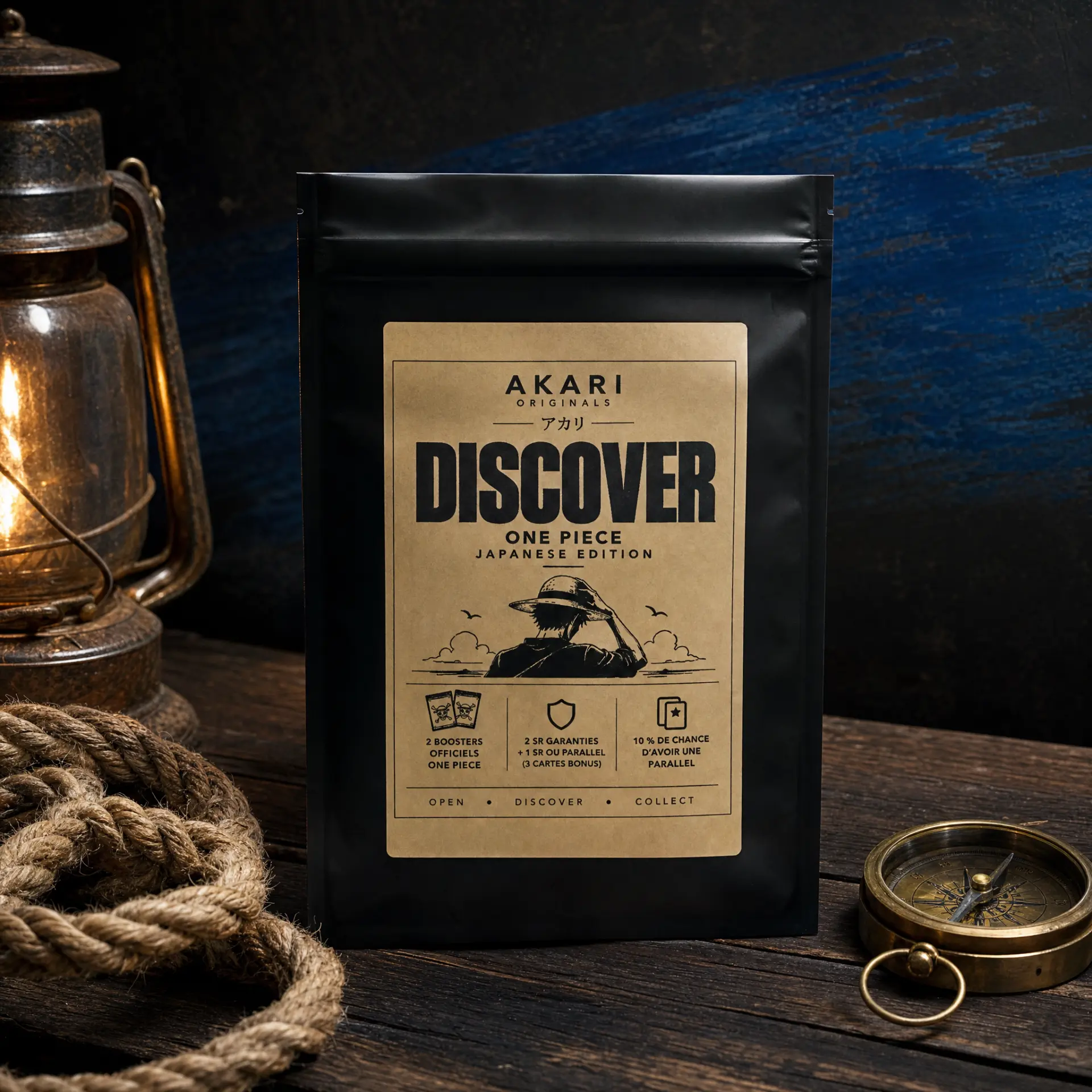 Akari Discover One Piece Japanese Edition — sachet noir à étiquette kraft sur une table en bois, lanterne, corde et boussole